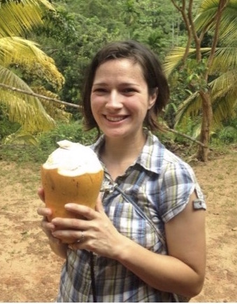 Laura Luttrell, SLPFC Postgraduate Fellow, with a coconut